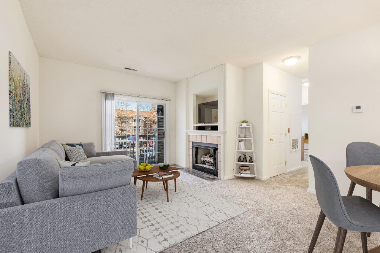 a living room with a couch and a table