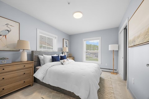 Serene bedroom with natural light and coastal decor at Pointe28 Apartments, Brunswick, ME 4011