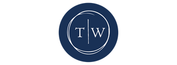 A blue circle with the letters T and W separated by a vertical line at Town Walk at Hamden Hills, Connecticut, 06518