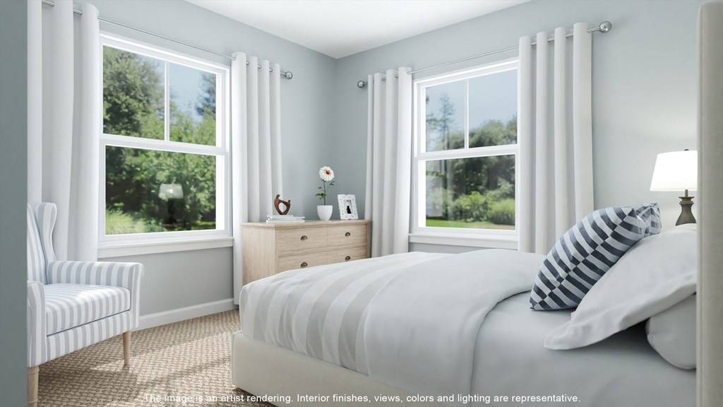 a bedroom with a bed and two windows