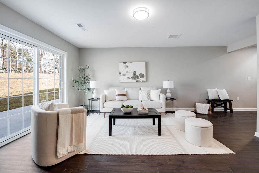 a living room with a couch and a table at Pleasant View Estates, Griswold