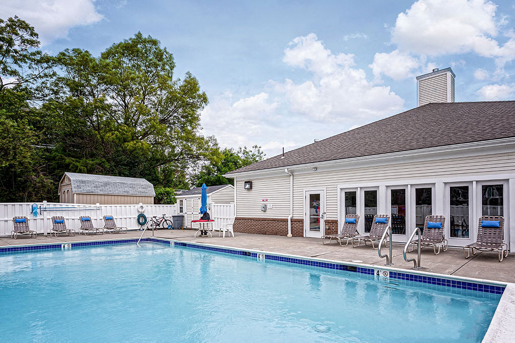 the swimming pool at the resort on a sunny day