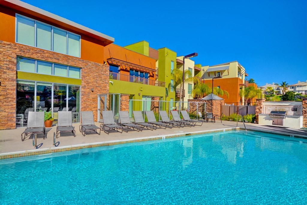 the swimming pool at the resort on a sunny day