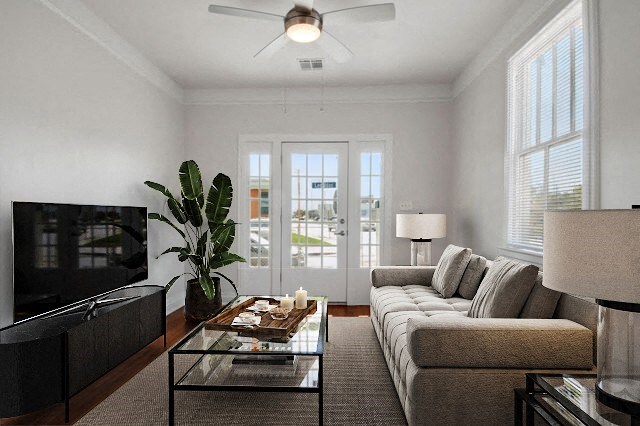 a living room with a couch and a television