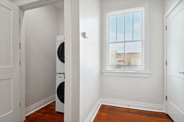 a room with a washing machine and a window