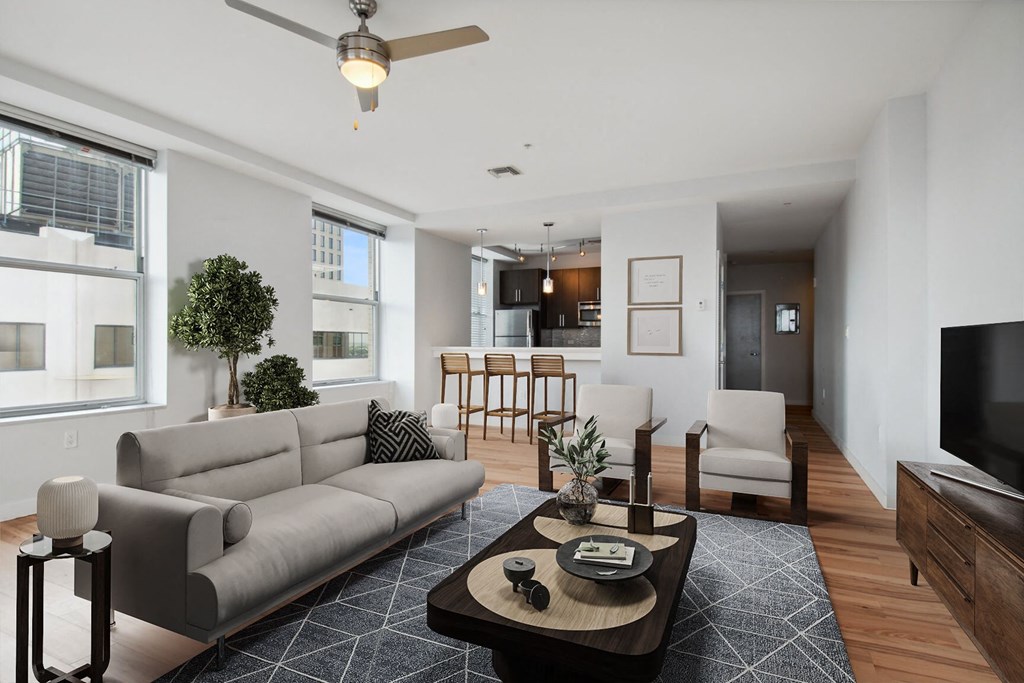 a living room with a couch and a table