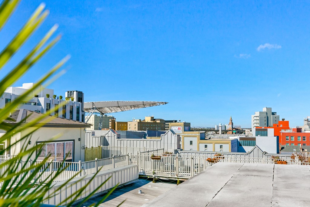 the view of the city from the roof of a building