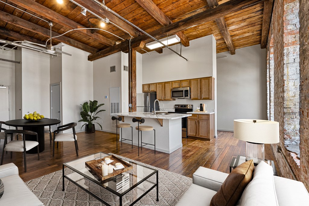 a living room with a couch and a table