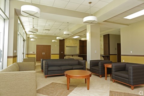 A spacious waiting room with a variety of seating options.