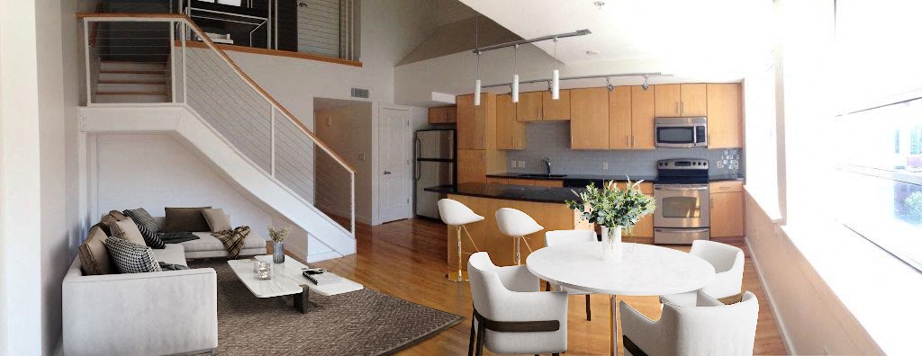 a living room and kitchen with a white table and chairs
