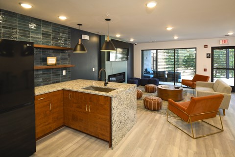 a kitchen and living room in a modern house