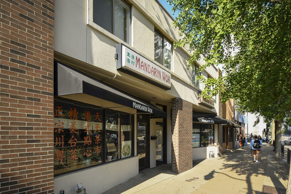 a view of the front of the building from the sidewalk