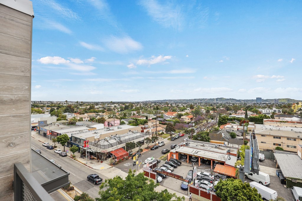 a view of the city from the top of a building at The Fairfax Flats Apartments, California, 90019