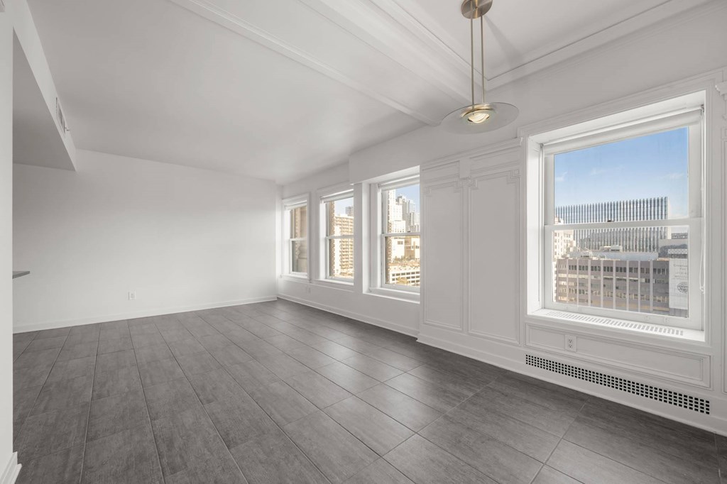 Room with Large windows at Grand Central Market Apartments, California, 90013
