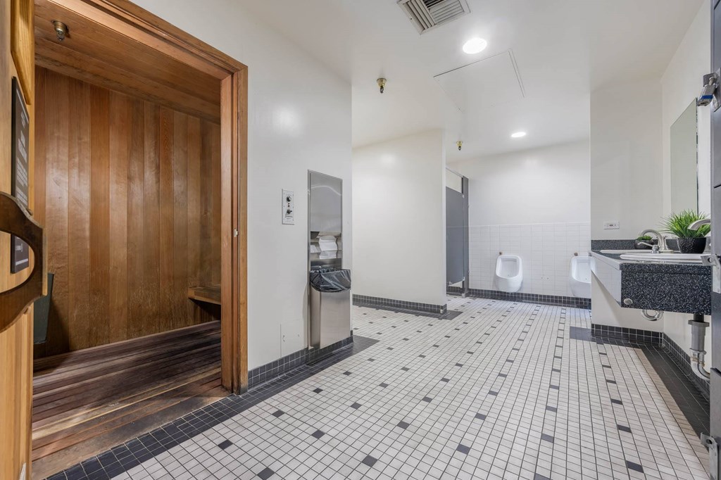 Bathroom with sink and mirror at Grand Central Market Apartments, Los Angeles, CA