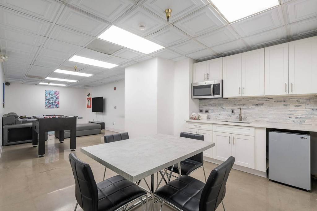 Kitchen with dining table at Grand Central Market Apartments, Los Angeles 