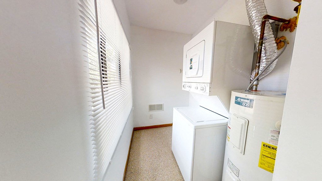 a laundry room with a washer and dryer