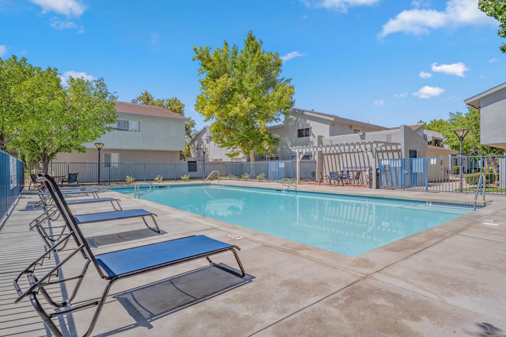 our apartments have a swimming pool with lounge chairs