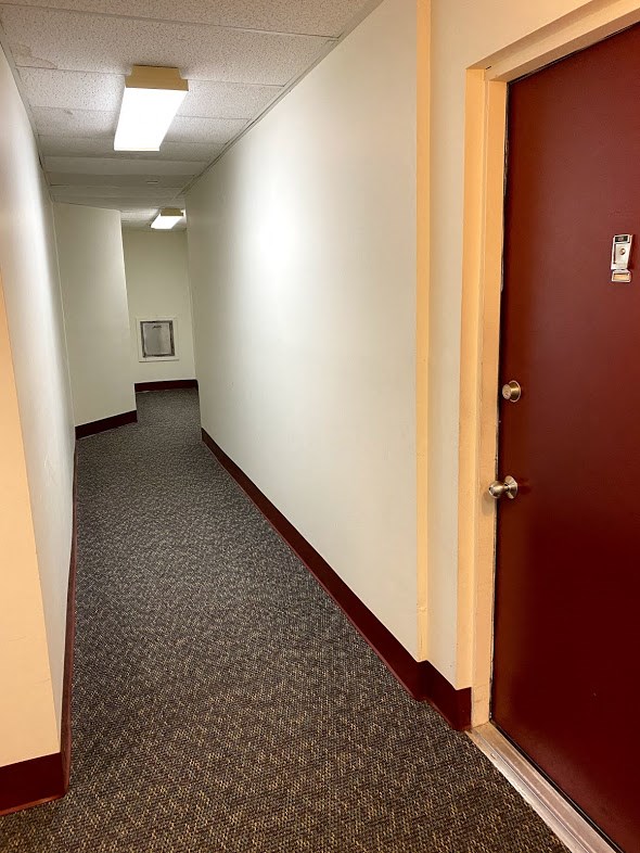 Loockerman Square Apartments - Residential Hallway / Trash Chute