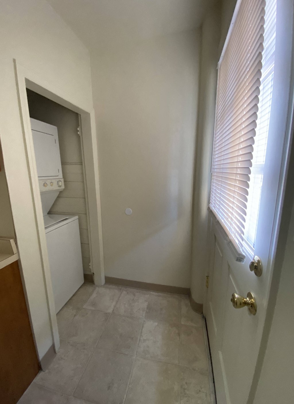 Kings Court Apartments - Front House - Laundry Center (Washer/Dryer) / Vinyl flooring / Exterior door to patio
