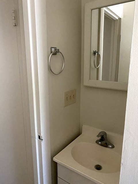 Garden Court Apartments - Bathroom Sink & Mirror
