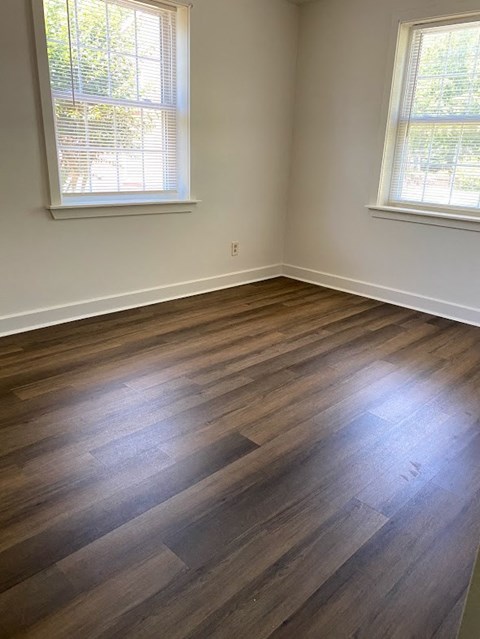 Garden Court Apartments - 2nd Bedroom / Wood-grain vinyl plank flooring