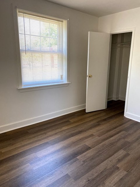 Garden Court Apartments - 2nd Bedroom / Closet / Wood-grain vinyl plank flooring
