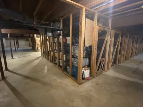 Kings Court Apartments - Main Building - Storage unit in basement for each apartment