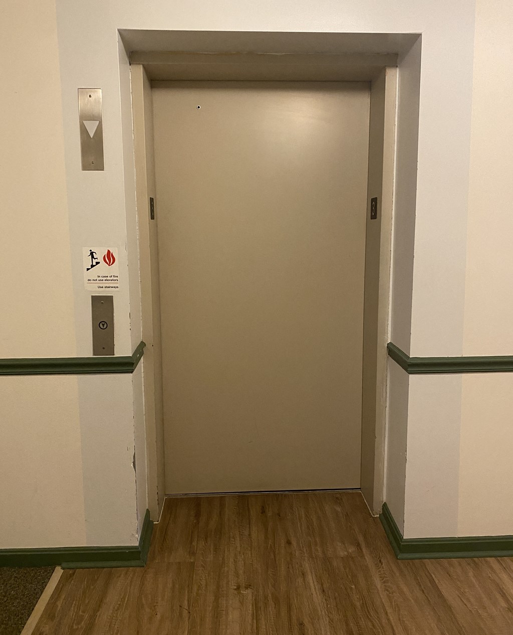 Kings Court Apartments - Main Building - Elevator / wood-grain, vinyl plank flooring