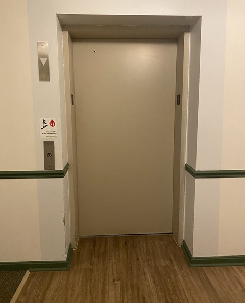Kings Court Apartments - Main Building - Elevator / wood-grain, vinyl plank flooring