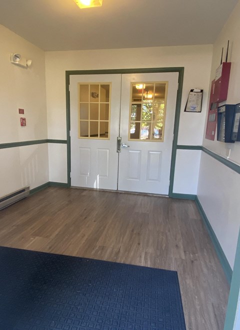 Kings Court Apartments - Main Building - Main Entrance / DoorKing Access / Wood-grain vinyl plank flooring