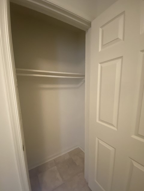 Kings Court Apartments - Main Building - Closet at apartment entry / Vinyl flooring