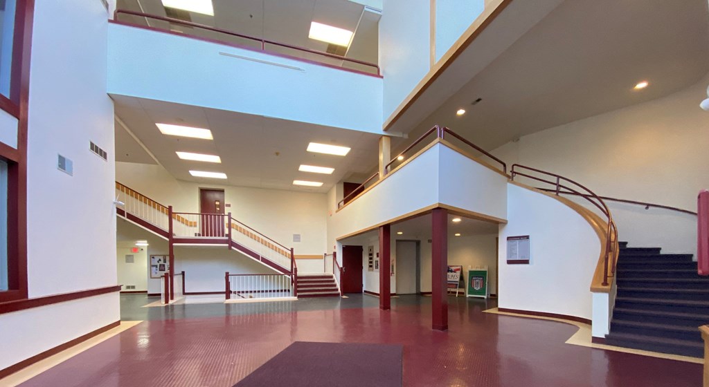 Loockerman Square Apartments - Atrium Lobby / Elevator / Stairs to Mezzanine Level