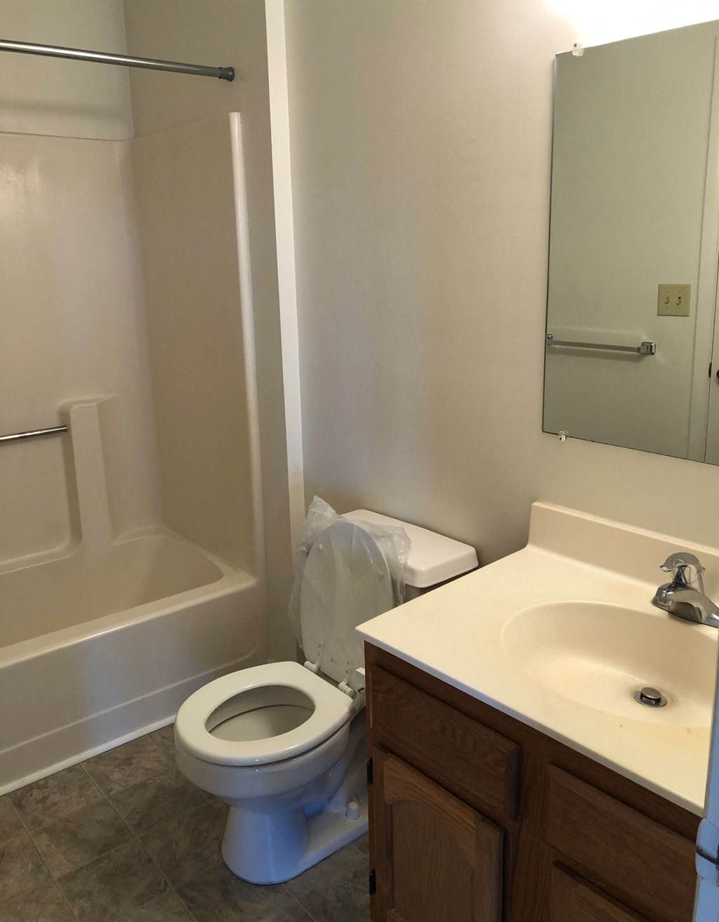 Loockerman Square Apartments - Bathroom with Tub / Vanity / vinyl flooring