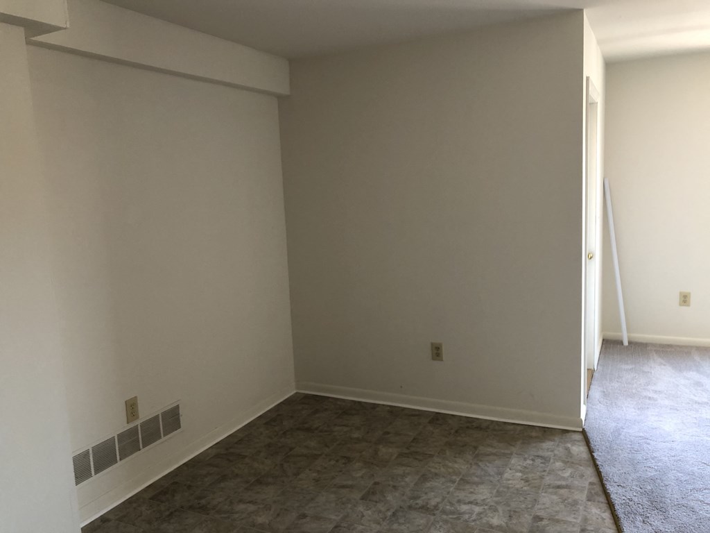 Loockerman Square Apartments - Dining Area/Living Room