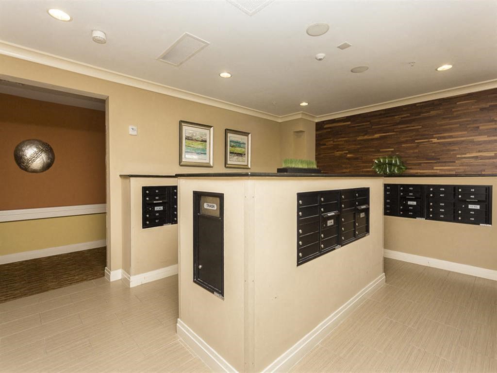 a large room with a counter and a mail room