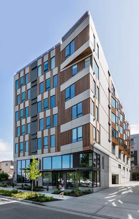 a tall building with a street in front of it