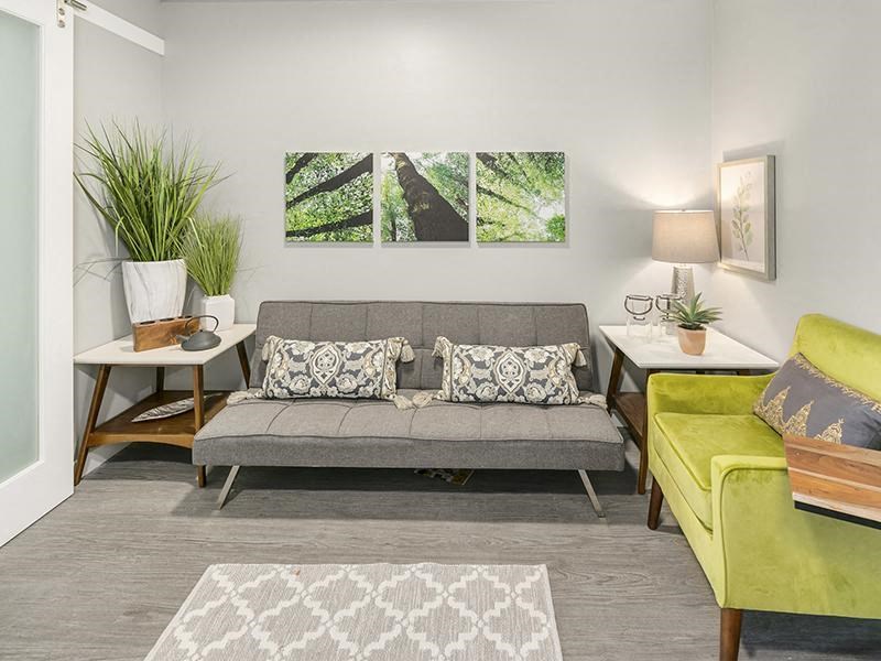 a living room with a couch and a table