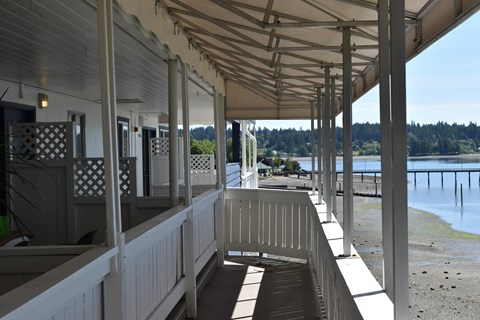a view from the porch of the beach house