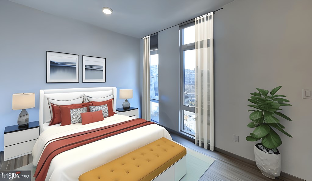 a bedroom with a bed and a window