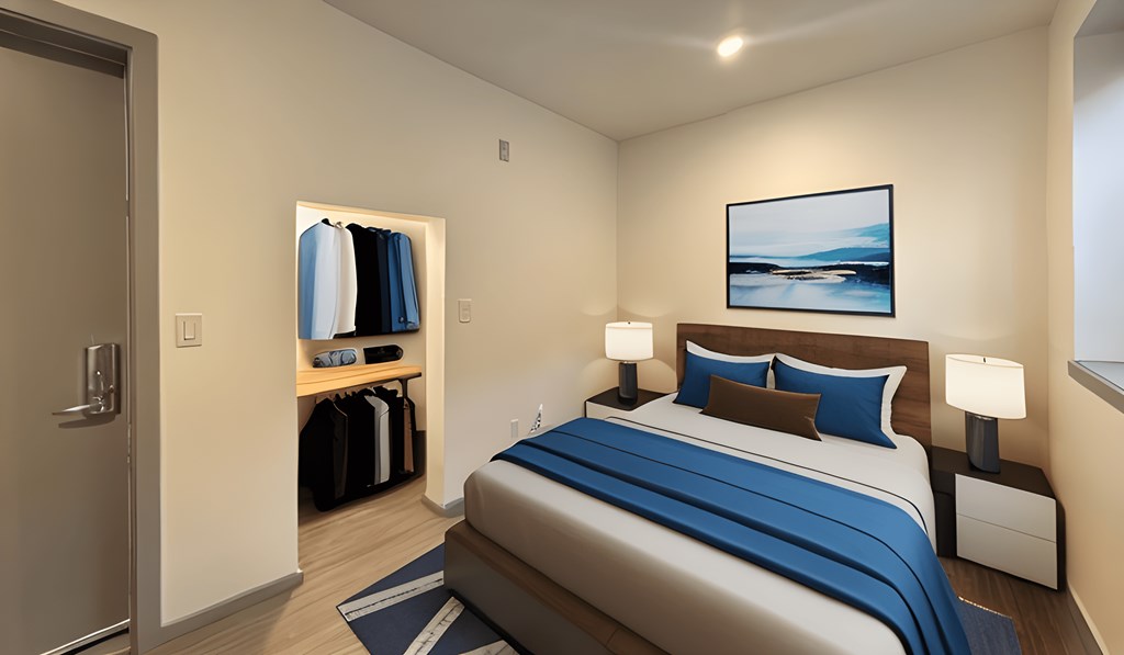 a bedroom with a bed in a hotel room