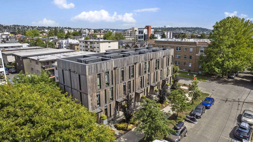 the facade of a building with a roof covered in solar panels