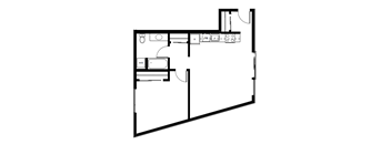 A floor plan of a room with a kitchen area and a bathroom.