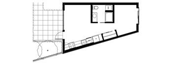 A floor plan of a room with a kitchen area and a bathroom.