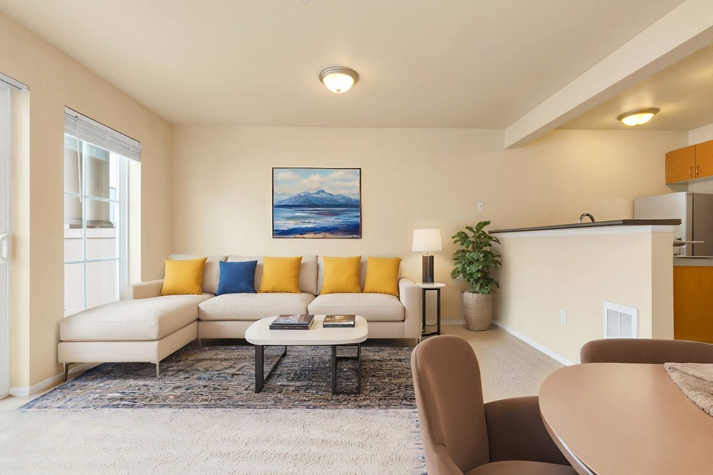 a living room with a couch and a table