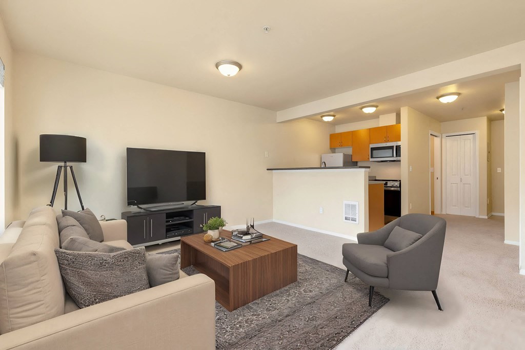 a living room with a couch and a table