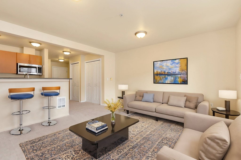 a living room with a couch and a table