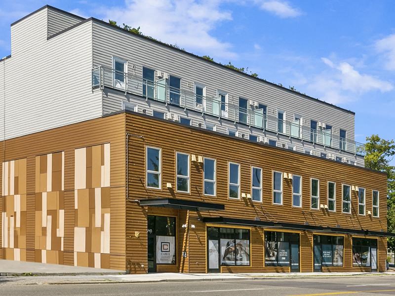 a large building on the side of a street