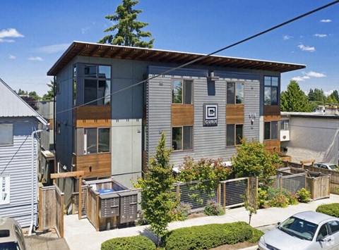 a house with a car parked in front of it