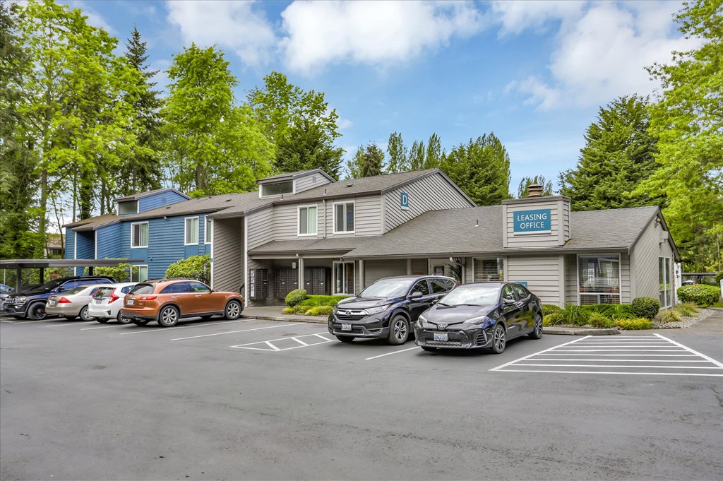 a parking lot in front of a building